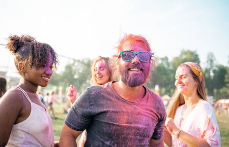 Colorful friends at summer holi festival