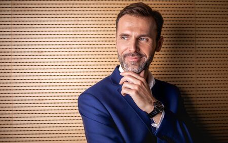 Portrait of handsome professional businessman looking at cameraの写真素材