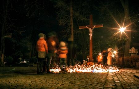 People in cemetery at All saints Dayの写真素材