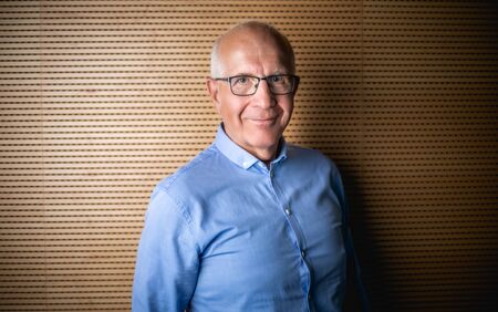 Portrait of senior businessman with eyeglasses looking at cameraの写真素材