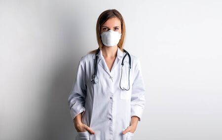 Virus mask female doctor wearing face protection in prevention for coronavirusの写真素材