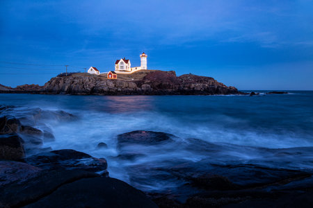 Lighthouse at night on the coast of Atlantic ocean in Brittany, Franceの写真素材