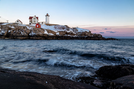 Lighthouse at the end of the day in winter.の写真素材