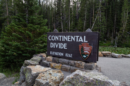 Sign at the entrance to the Continental Divide in a national parkの写真素材
