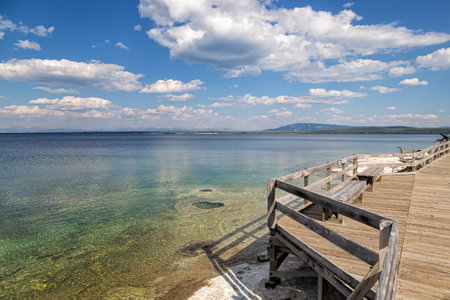 Wooden jetty on the shore of a lakeの写真素材