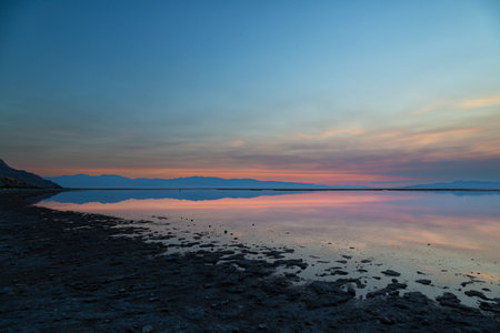 Sunset on the beach of Great Salt Lake Utahの写真素材