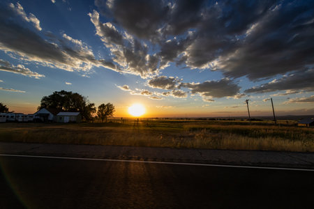 Sunset on a rural road in the countryside of northern California.の写真素材
