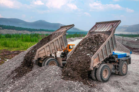 Mountainous dump truck is widely used for transporting and unloading rocks. Mining.の写真素材