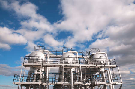 Industrial equipment at an oil refinery station.
Oil and gas industry, oil refining and refiningの写真素材