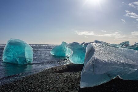 ice fields at the black pebble beach, coast of iceland