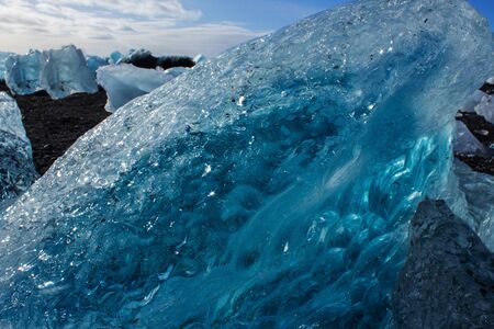 ice fields at the black pebble beach, coast of iceland