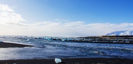 ice fields at the black pebble beach, coast of iceland