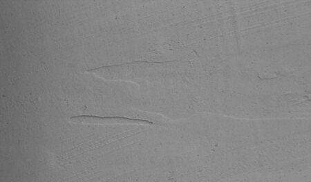 Texture of a freshly filled wall, the plaster is still moistの写真素材