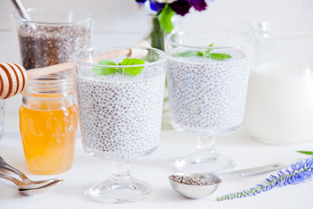Chia seeds yogurt pudding with honey in glasses for breakfastの写真素材