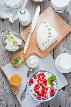 Natural dairy products on a light gray wooden backgroundの写真素材