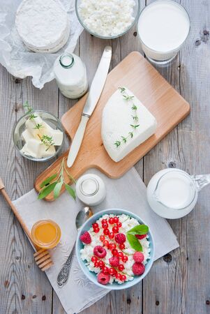 Natural dairy products on a light gray wooden backgroundの写真素材