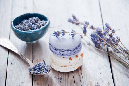 Gourmet small colorful French macarons with lavender flavorの写真素材