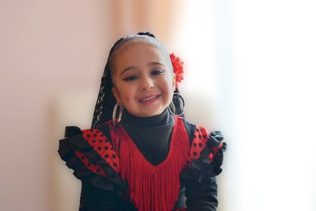 Beautiful girl smiling with original dress  Spanish dancer の写真素材