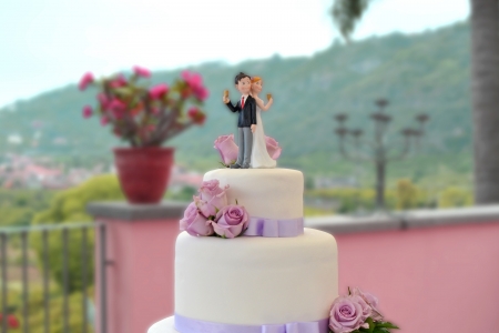Wedding cake with bride and groomの写真素材