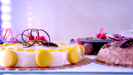 Set of decorated cakes of different flavors