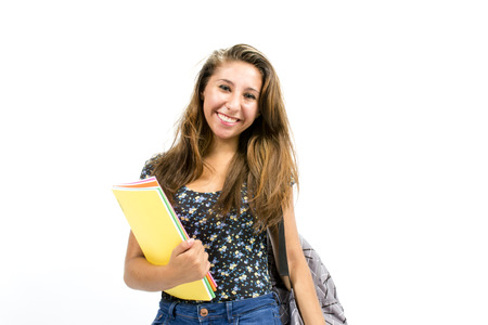 Girl student with colorful notebooks in handの写真素材