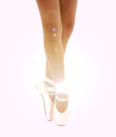 Young ballet dancer dancing on pointeの写真素材