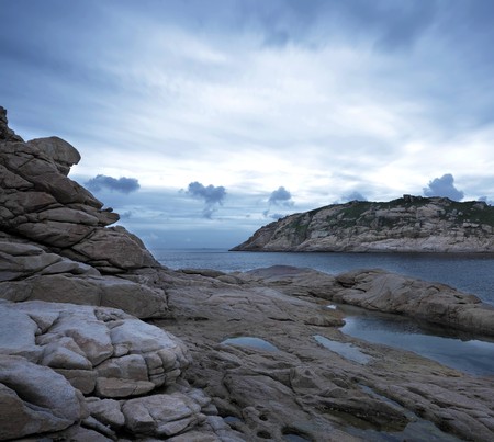 storm sky with the rocks, low saturationの写真素材