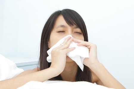 sneeze girlの写真素材