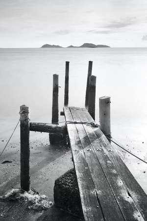 pier go into sea , black and whiteの写真素材