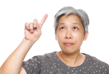 Woman pointing upの写真素材