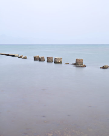 broken stone bridge on seaのeditorial素材