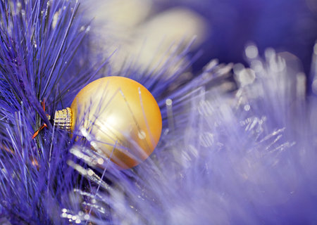 christmas ball on blue color christmas treeのeditorial素材