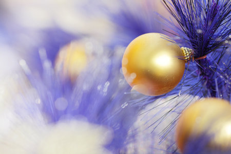 christmas ball on blue color christmas treeのeditorial素材