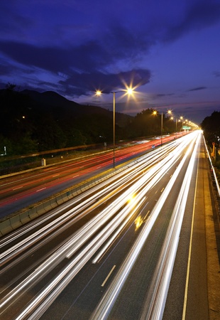 traffic on highway at nightの写真素材