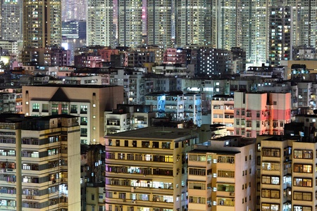 crowded building at night in Hong Kongの写真素材