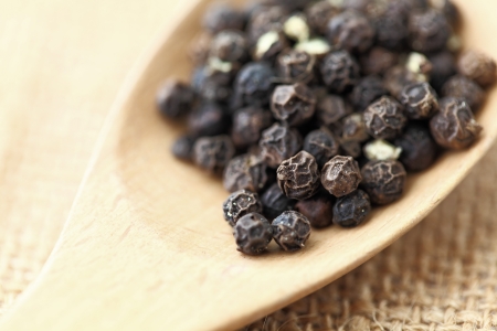 pepper in wooden spoon