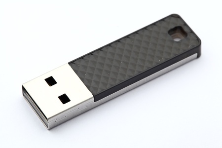 Flash memory stick on white background 