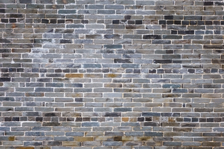 Ancient gray brick wall