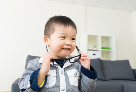 Asian little boy wear glassesの写真素材
