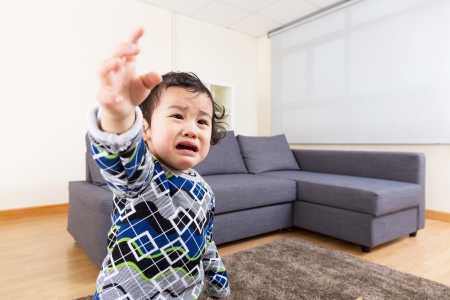 Baby boy feeling upsetの写真素材