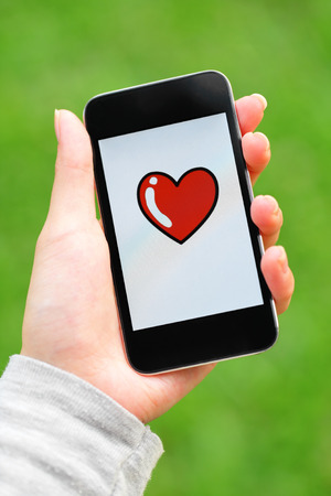 Love message on mobile phone screenの写真素材