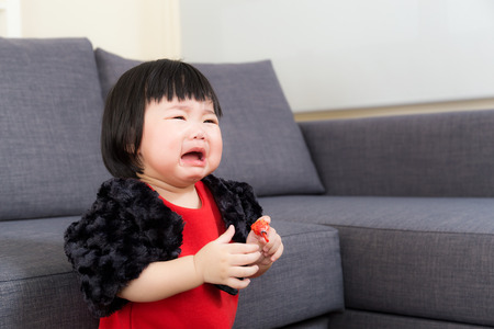 Asian baby girl cryingの写真素材