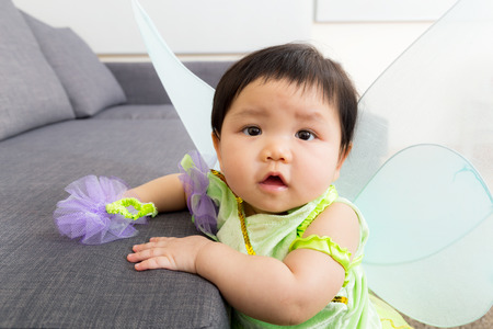 Asia baby girl with halloween party costumeの写真素材