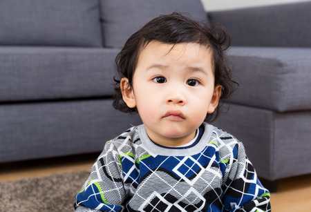 Little boy feel hesitationの写真素材