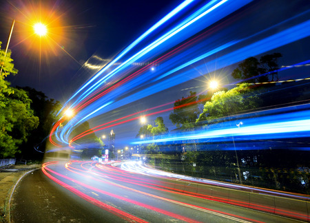 Busy traffic on road at nightの写真素材