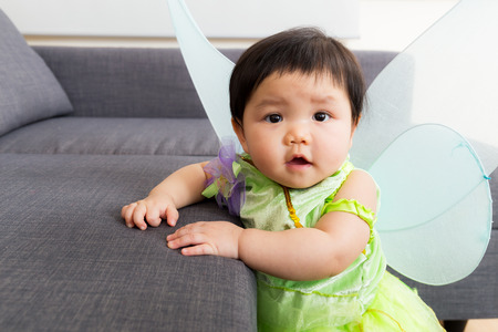 Asia baby girl with halloween party dressing at homeの写真素材