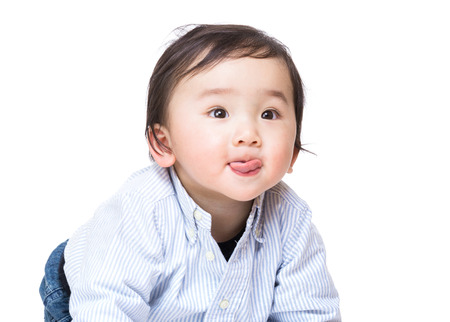 Asia baby boy making funny faceの写真素材