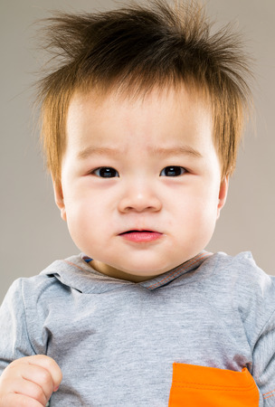Asian serious kidの写真素材