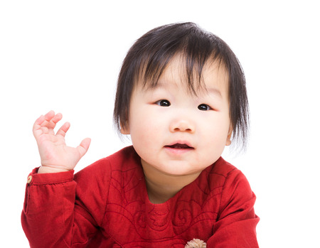 Asia baby girl hand upの写真素材