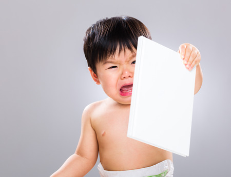 Little boy hate bookの写真素材